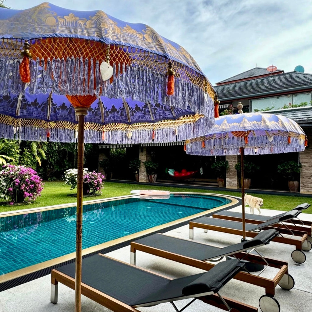 lavender umbrellas in the pool side