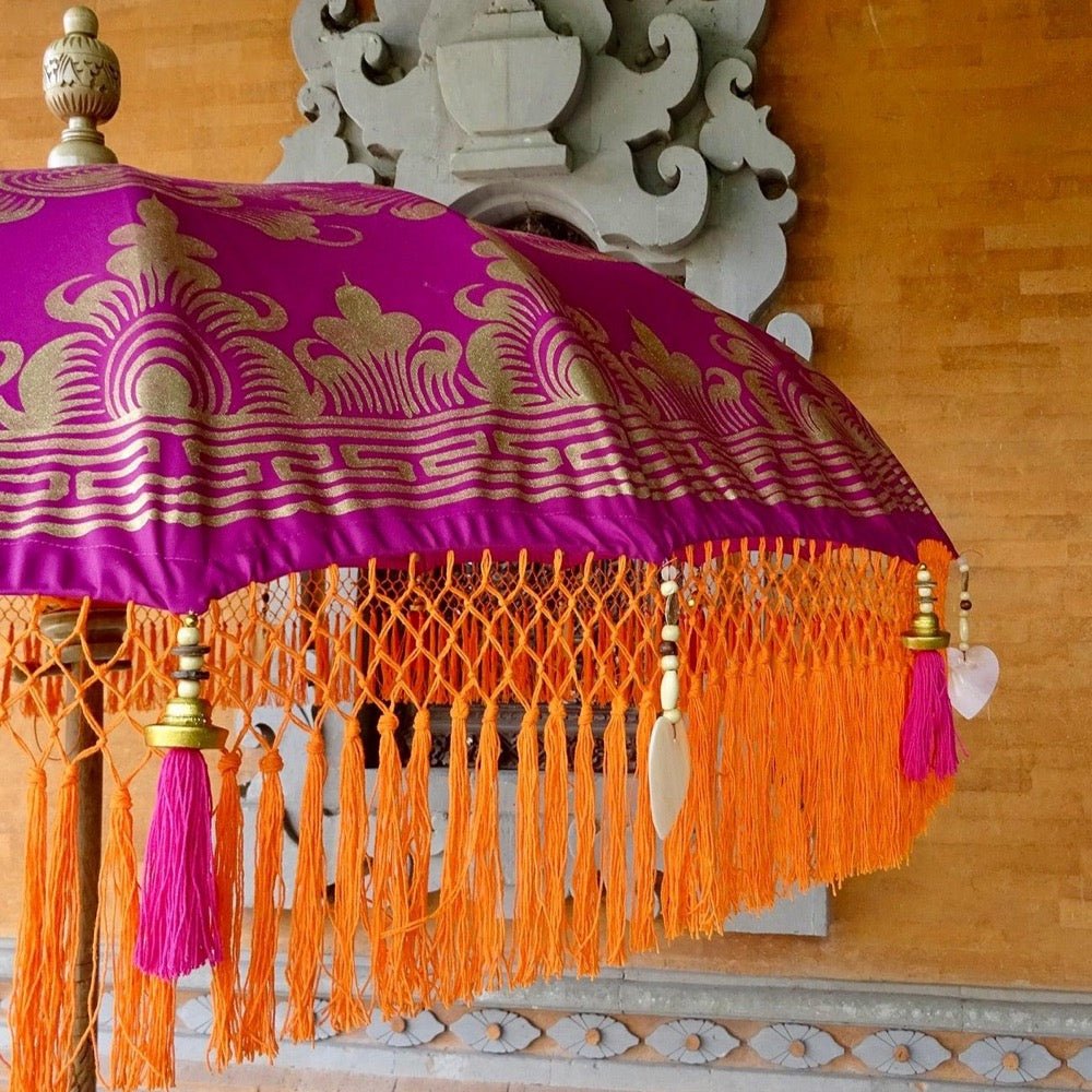 Detailed close-up of the gold hand-painted design on the Cecilia Parasol, blending luxury and color.