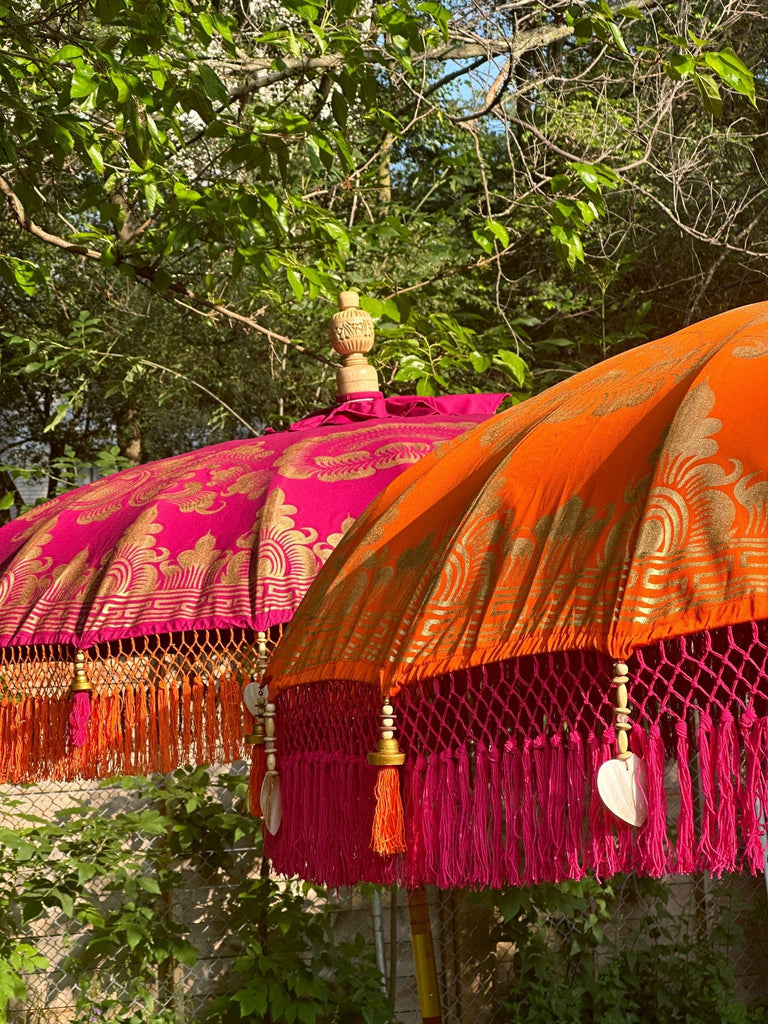 Detailed close-up of the gold hand-painted design on the Cecilia Parasol, blending luxury and color.